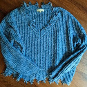 Shaggy edged blue sweater